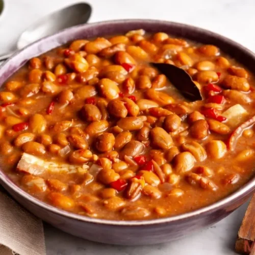 Bojangles pinto beans served in a bowl with garnished cilantro copycat Southern recipe