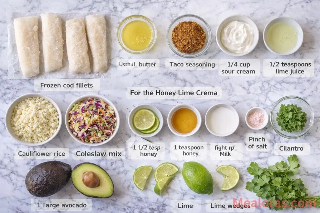 ingredients for fish taco bowls including cod fillets, lime, avocado, and spices