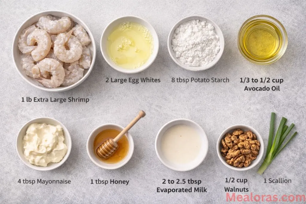 Raw shrimp, potato starch, honey, mayonnaise, and walnuts arranged in small bowls on a kitchen counter